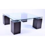 A square glass coffee table by Roche Bobois standing on four hardwood legs, 100 cm square x 42 cm
