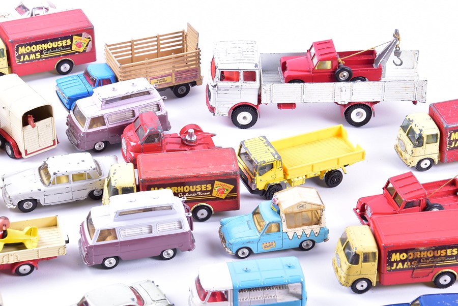 A large quantity of loose and playworn Corgi Toys diecast vehicles to include advertising vans, - Image 4 of 7