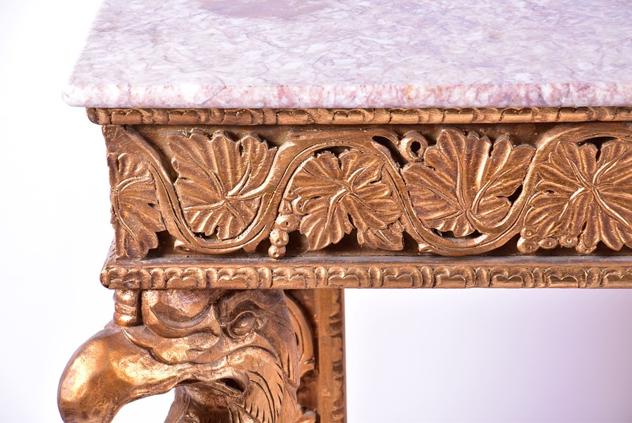 A reproduction gilt painted and marble-topped console table the front columns formed as stylised - Image 4 of 5