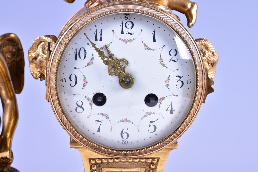 A 19th century French ormolu drum shaped mantel clock the white enamel dial with painted flowers, - Image 2 of 7