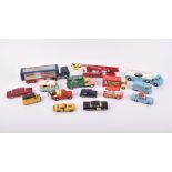 A collection of fifteen loose and playworn Corgi diecast vehicles to include a 'Milk' Big Bedford