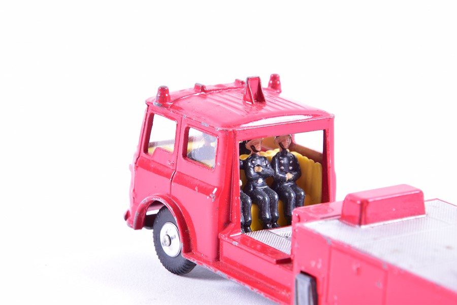 A collection of loose and playworn Dinky diecast vehicles to include buses, fire engines, commercial - Image 8 of 8