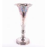A German Art Nouveau silver vase stamped 800, the fluted neck pierced with floral patterns in the