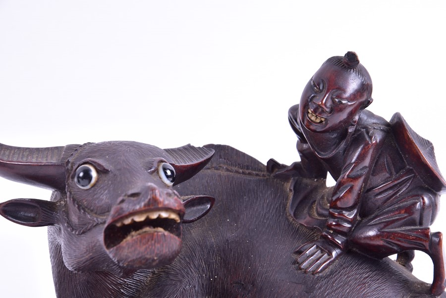 A pair of Chinese carved hardwood 'Buffalo and child' models with textured detail to the buffalos, - Image 6 of 9