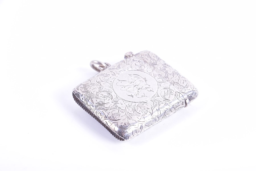 Two silver vesta cases and a miniature pill box the larger vesta decorated with crawling floral work - Image 6 of 7