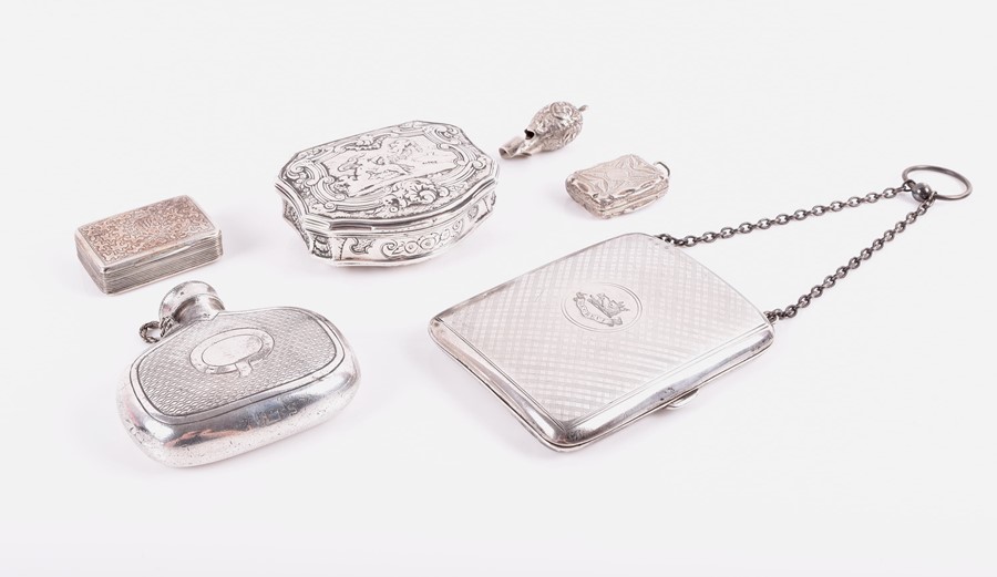 An Edwardian silver cigarette case Chester 1903, by William Neale, of curved form with carry chain