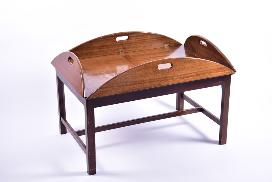 A large early 20th century mahogany butler's tray on stand 122 cm x 90 cm x 63 cm high.