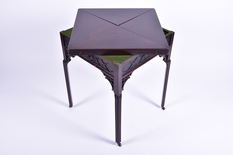 A 19th century rosewood envelope card table with pierces and carved frieze, opening to reveal a - Image 7 of 8