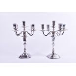 A pair of 20th century Egyptian silver candelabra each with four branches on curved arms, the