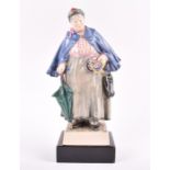 A Charles Vyse ceramic figure: 'The Kettle Holder' impressed 'C Vyse Chelsea' to the base, mounted