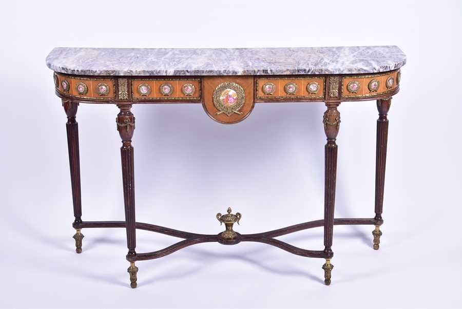 A 20th century French Louis XVI style console table with marble top, above a porcelain mounted
