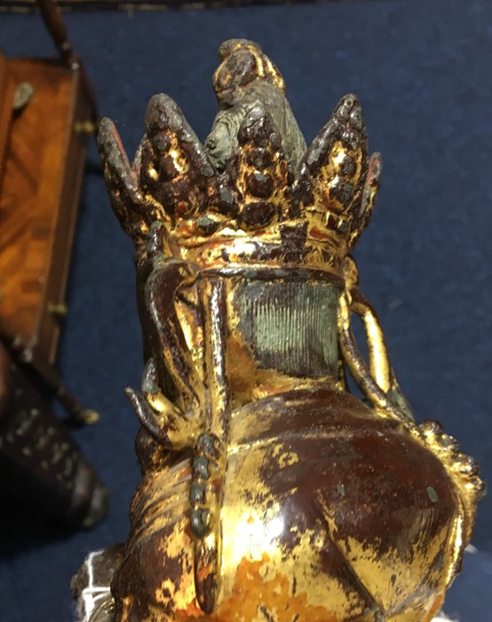 A 19th century or earlier Tibetan gilt bronze sculpture of Padmasambhava modelled seated in - Image 10 of 10