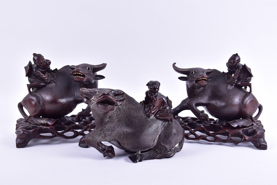 A pair of Chinese carved hardwood 'Buffalo and child' models with textured detail to the buffalos, - Image 4 of 9