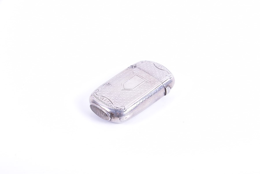 Two silver vesta cases and a miniature pill box the larger vesta decorated with crawling floral work - Image 3 of 7