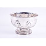 A early 20th century silver rose bowl London, 1903, with repousse floral scroll decoration. 18 cm