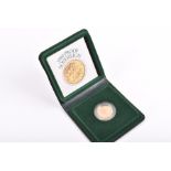 An Elizabeth II 1980 proof full Sovereign  in a Royal Mint green box with leaflet.