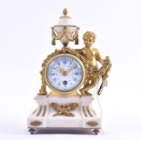 A 19th century Louis XVI style French mantel clock designed with a cast ormolu model of a winged