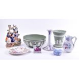 A collection of British decorative porcelain to include two Staffordshire groups of Highlanders,