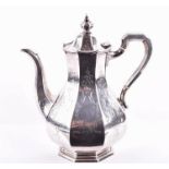 A 19th century silver coffee pot 1853 London, William Ker Reid, the  faceted body decorated in