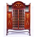 Shapland & Petter: a fine mahogany display / bookcase cabinet circa 1900, with marquetry and