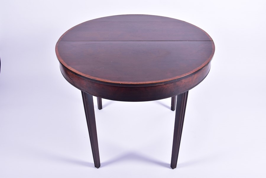 A 19th century walnut demi-lune fold over tea table on tapering legs, 92 cm wide. - Image 4 of 4