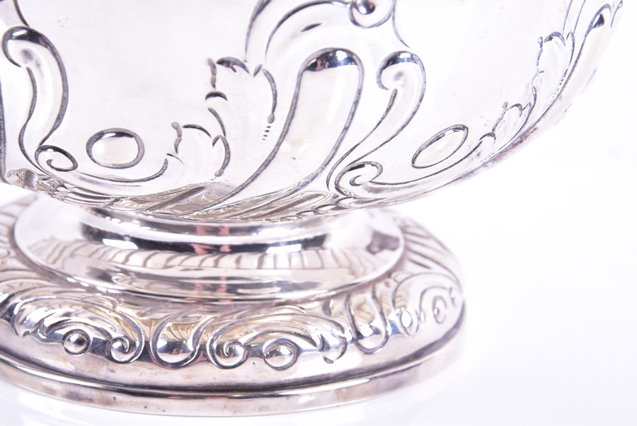 A early 20th century silver rose bowl London, 1903, with repousse floral scroll decoration. 18 cm - Image 3 of 3