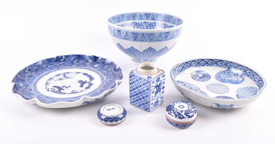 A Chinese blue and white porcelain lobbed bowl the interior decorated with patterned roundels, one