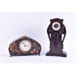 A 20th century Arts and Crafts style mantel clock the circular dial signed 'Paico' within a hardwood