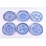 A group of six 19th century and earlier Chinese porcelain plates some decorated with fish,