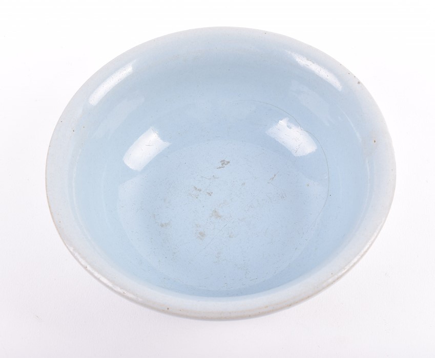 A Chinese powder blue bowl possibly Song dynasty, of even powder blue colour, with some pitting to - Image 3 of 5