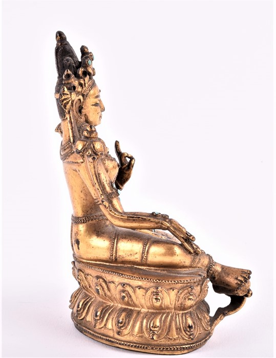A fine Tibetan gilt metal figure of Tara, 15th/16th century, cast seated in lalitasana on a double - Image 7 of 8