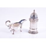 A late 19th century silver caster London, 1886, with finely pierced detail and gadroon borders,