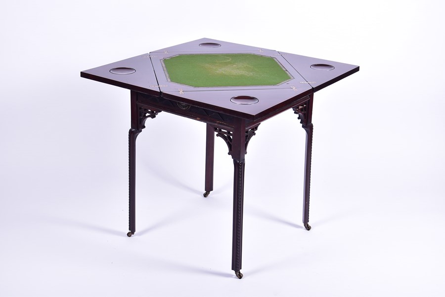 A 19th century rosewood envelope card table with pierces and carved frieze, opening to reveal a - Image 4 of 8