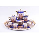 A 20th century Vienna porcelain cabaret set comprising a coffee pot, a sugar pot, a milk jug, and