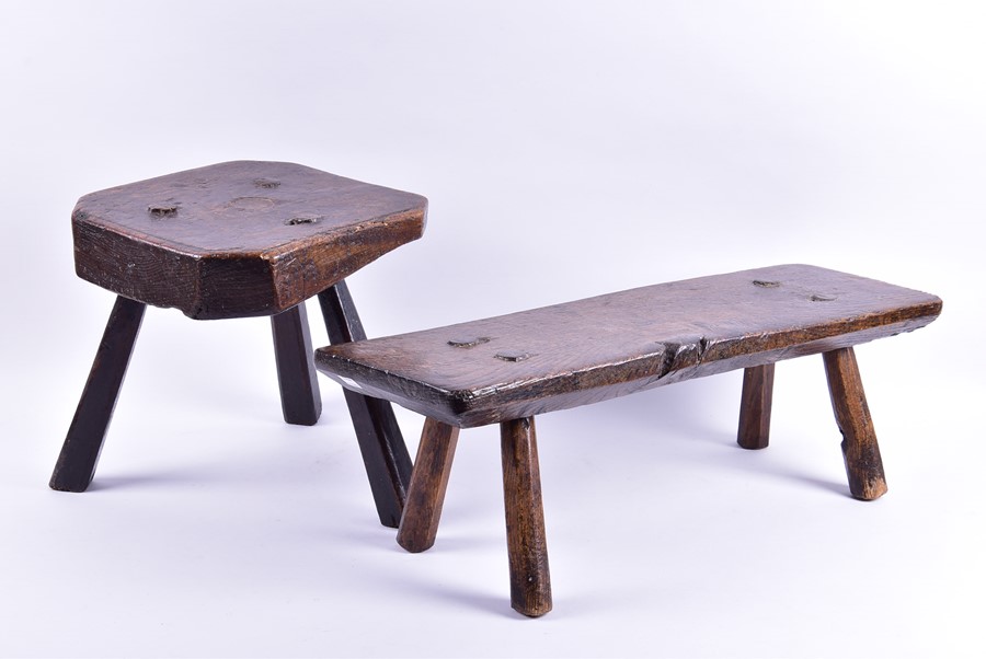 A mid eighteenth century provincial square oak milking stool 29 cm wide x 30 cm high, together