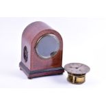 A Victorian burr yew veneered mantel clock by J.W Benson the arched shaped case with barber pole