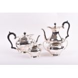 Of Huntley & Palmers interest: An Edwardian silver four piece tea set Sheffield 1905 & 1906, by John