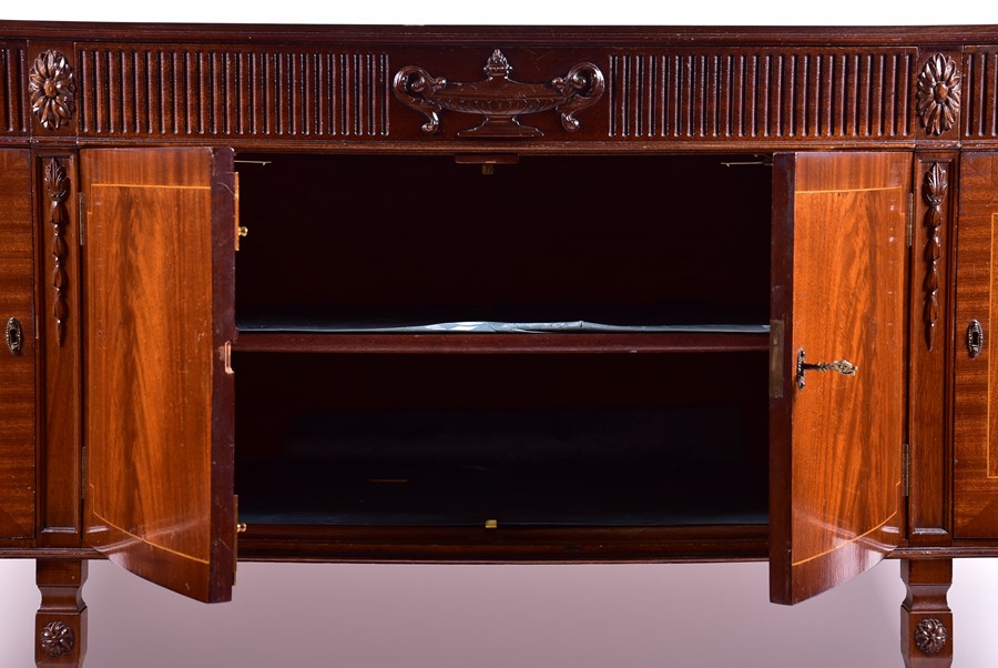 An Adam style marble top sideboard of serpentine form with reeded frieze designed with central urn - Image 2 of 6