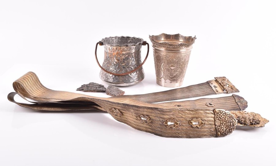 Two silver gilt Middle Eastern belts together with two white metal buckets, one hallmarked, weight