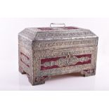 A mid 19th century colonial Spanish jewel box cased in heavily decorated silver with flashes of