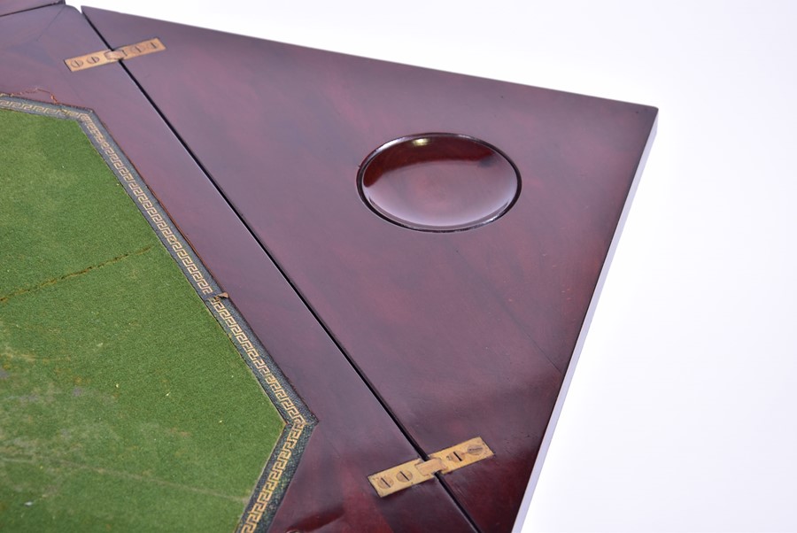 A 19th century rosewood envelope card table with pierces and carved frieze, opening to reveal a - Image 5 of 8