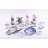 A collection of Royal Copenhagen and Bing & Grondahl ceramics to include a 779 Girl with Calf,