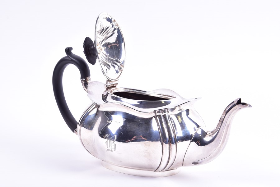 A George V silver teapot Sheffield 1916, by R F Mosley & Co, with lobed shaped body mounted with - Image 2 of 5