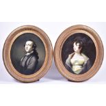 A pair of 20th century oval portraits of a lady and a gentleman overpainted prints, each 59 cm x