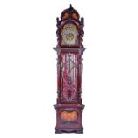 A fine and very large Edwardian musical longcase clock the brass dial with silvered chapter ring,