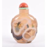 A Chinese agate snuff bottle with hand painted interior depicting a dragon and crickets, the lid