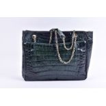 A 1980's Chanel handbag in green exotic leather most likely caiman skin, with two outside patch