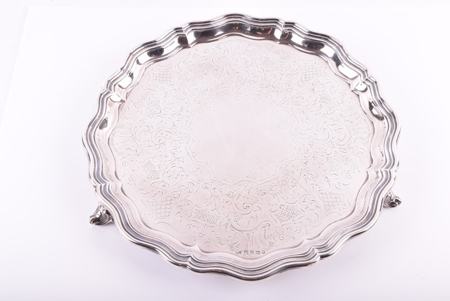 A Victorian silver salver Sheffield 1856, James Dixon and Sons, with scalloped borders, raised on - Image 3 of 6