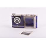 A 1950s West German 'Petie' camera / vanity compact with chrome blue marbled effect body, camera,