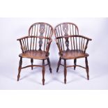 A near pair of 19th century elm and ash Windsor armchairs each with pierced vase splatbacks and